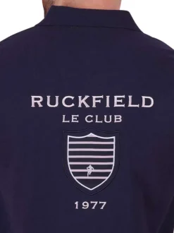 Polo en coton marine en maille piquée avec une coupe droite et un col à revers
