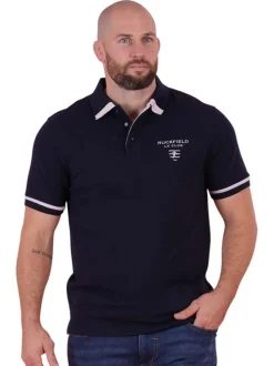Polo en coton marine en maille piquée avec une coupe droite et un col à revers