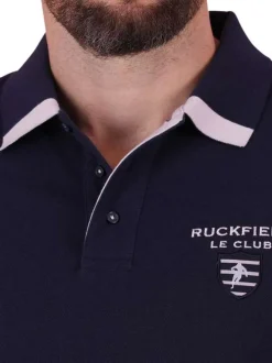 Polo en coton marine en maille piquée avec une coupe droite et un col à revers