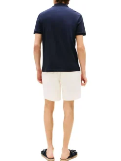 Polo en coton marine uni avec un col à rabats et des manches courtes