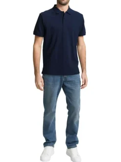 Polo en coton marine uni avec une coupe droite et un col boutonné