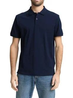 Polo en coton marine uni avec une coupe droite et un col boutonné