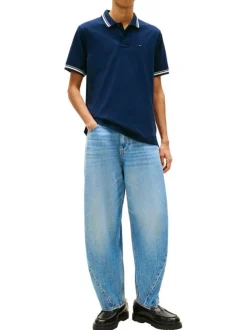Polo en coton marine uni avec une coupe droite et un col à revers