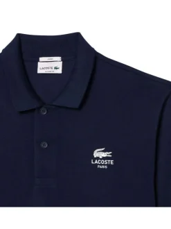 Polo en coton marine uni à coupe droite et col fermé par boutons ton sur ton