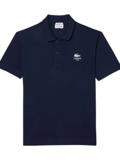 Polo en coton marine uni à coupe droite et col fermé par boutons ton sur ton