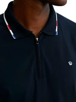Polo en coton marine uni pourvu d'un col zippé et de manches courtes