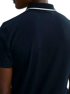Polo en coton marine uni pourvu d'un col zippé et de manches courtes