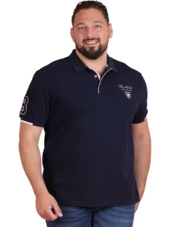 Polo en coton marine uni pourvu d'une coupe droite et d'un col boutonné