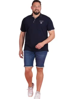 Polo en coton marine uni pourvu d'une coupe droite et d'un col boutonné