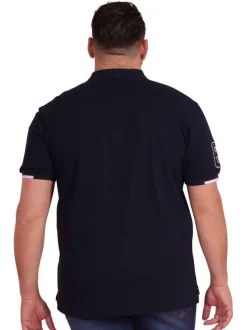 Polo en coton marine uni pourvu d'une coupe droite et d'un col boutonné