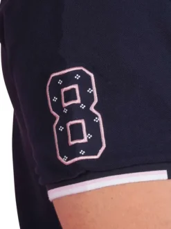 Polo en coton marine uni pourvu d'une coupe droite et d'un col boutonné
