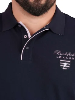 Polo en coton marine uni pourvu d'une coupe droite et d'un col boutonné