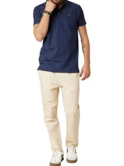 Polo en coton marine uni pourvu d'une coupe droite et d'un col boutonné
