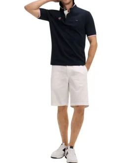 Polo en coton marine uni pourvu d'une coupe droite et d'un col boutonné