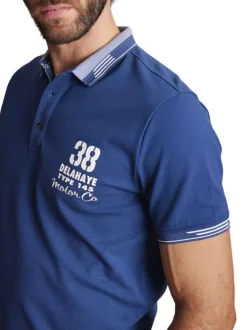 Polo en coton mélangé bleu uni à coupe droite imprimé à la poitrine gauche