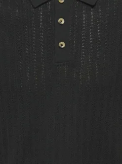 Polo en coton mélangé noir pourvu d'un col boutonnée et de manches courtes