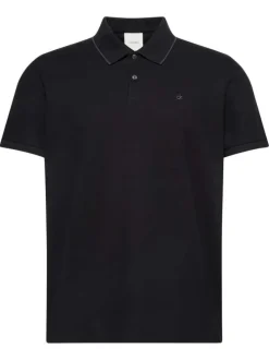 Polo en coton noir à coupe droite pourvu d'un col à revers boutonné