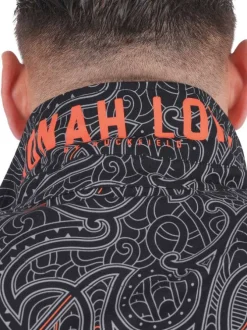 Polo en coton noir à motifs pourvu d'un col boutonné et d'une coupe droite