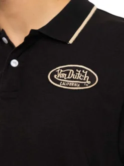 Polo en coton noir uni avec une coupe droite et un col boutonné