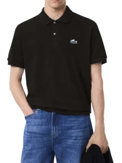 Polo en coton noir uni avec une coupe droite et un col boutonné