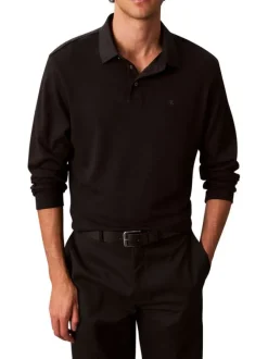 Polo en coton noir uni coupe ajustée et un col à revers boutonné