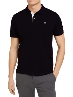 Polo en coton noir uni coupe droite avec un col boutonné et en maille piquée