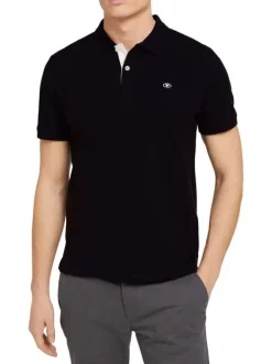 Polo en coton noir uni coupe droite avec un col boutonné et en maille piquée