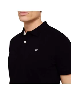 Polo en coton noir uni coupe droite avec un col boutonné et en maille piquée