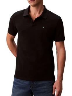 Polo en coton noir uni à coupe slim avec le logo brodé en petit