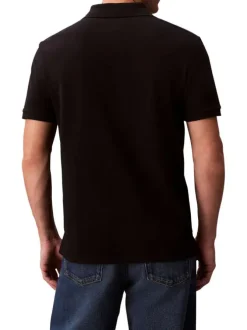 Polo en coton noir uni à coupe slim avec le logo brodé en petit
