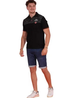Polo en coton noir uni pourvu d'une coupe droite et d'un col boutonné