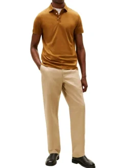 Polo en coton orange à coupe ajustée pourvu d'un col boutonné