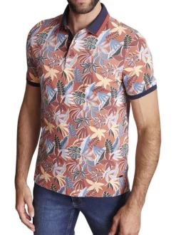 Polo en coton orange fleuri à coupe slim fit et à col fermé par trois boutons