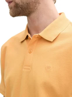 Polo en coton orange uni à coupe droite avec des manches courtes
