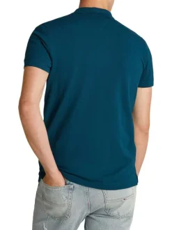 Polo en coton régénératif sapin uni à coupe droite et col fermé par boutons