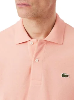 Polo en coton rose à coupe droite pourvu d'un col à revers boutonné