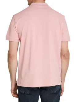 Polo en coton rose uni pourvu d'un col boutonné et de manches courtes