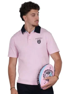 Polo en coton rose uni pourvu d'une coupe droite et d'un col boutonné