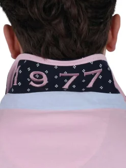 Polo en coton rose uni pourvu d'une coupe droite et d'un col boutonné