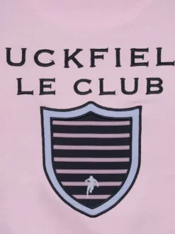 Polo en coton rose uni pourvu d'une coupe droite et d'un col boutonné