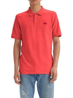 Polo en coton rouge uni avec un col boutonné et une coupe droite