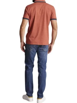 Polo en coton rouille à imprimé minis pois bleus marine et à coupe slim