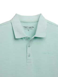 Polo en coton turquoise uni à coupe droite avec le nom de la marque