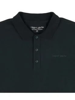 Polo en coton vert uni avec une coupe droite et le nom de la marque