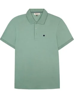 Polo en coton vert uni avec une coupe droite et un col boutonné