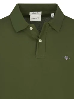 Polo en coton vert uni à coupe ajustée avec col boutonné et des manches longues