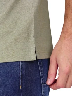 Polo kaki à coupe droite pourvu d'un col boutonné et de manches courtes