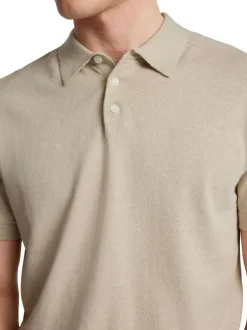 Polo manches courtes en coton beige en maille à coupe regular et col à revers
