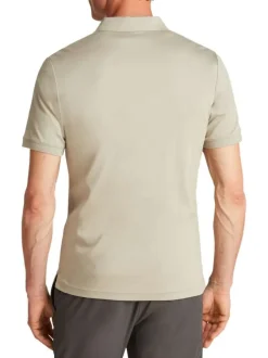 Polo à manches courtes en coton beige uni avec une coupe ajustée