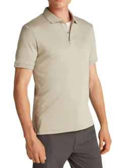 Polo à manches courtes en coton beige uni avec une coupe ajustée